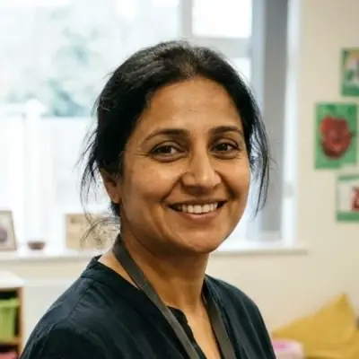 Aisha Khan, M.A.